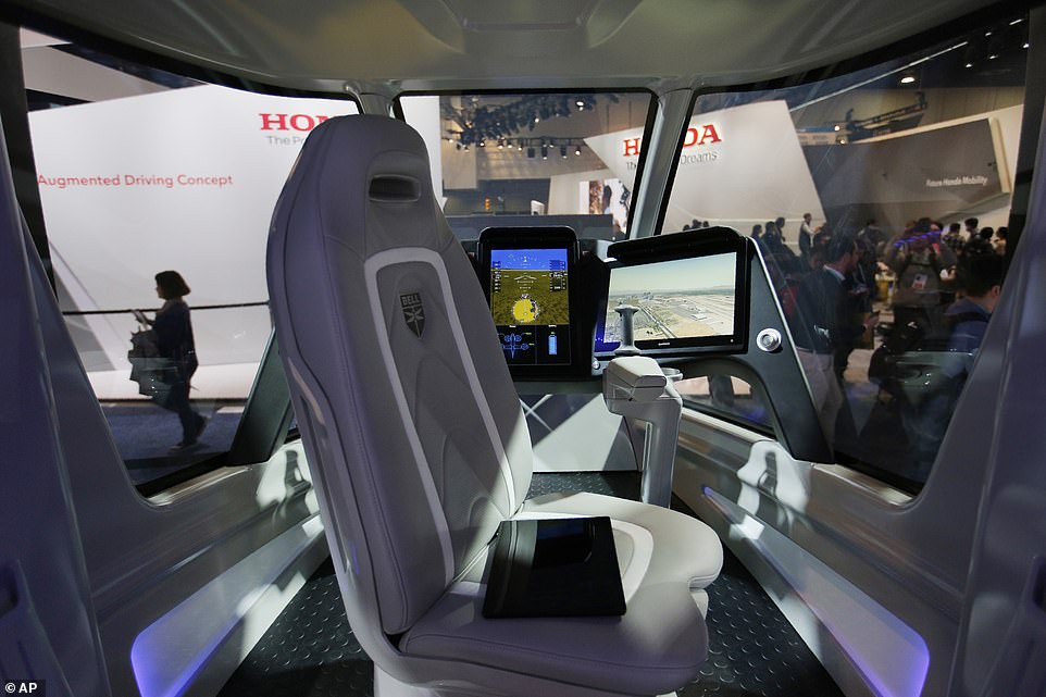 The inside of the plan sits up to five passengers and a pilot who will control the vehicle using a joystick and digital screens