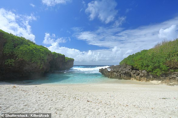 Christmas Island, pictured, which is famous for its red crabs, sea birds and spectacular coral reefs