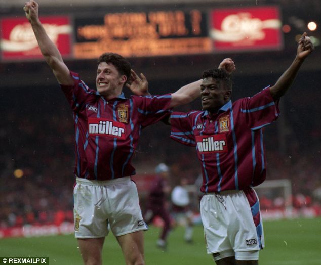 Cup of joy: Captain Andy Townsend celebrates Villa's 1994 Wembley win against Manchester United with Tony Daley (right)