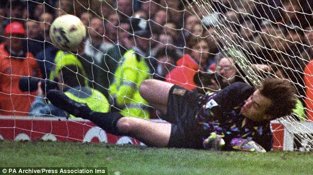 Show stopper: Bosnich saves a kick in the shootout