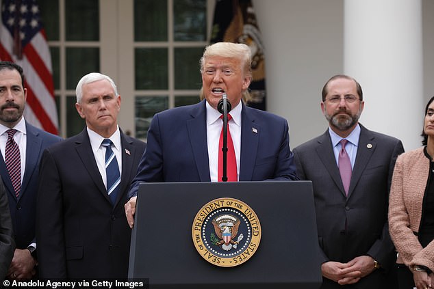 Donald Trump is seen giving a press conference in the White House Rose garden on Friday