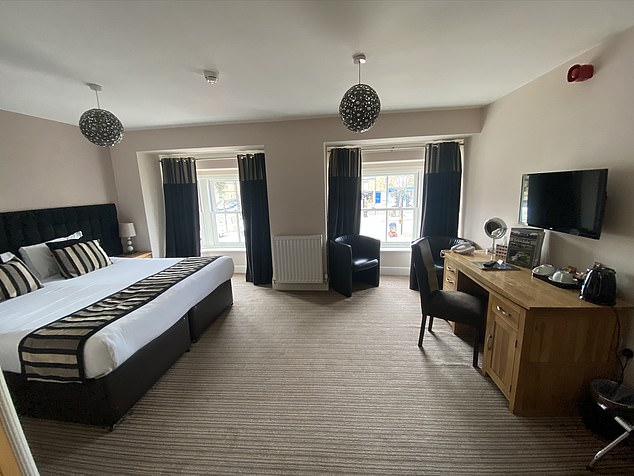 The rooms in the Three Horseshoes Hotel, pictured, feature 'large comfortable beds, a TV, free wi-fi and hairdryers'