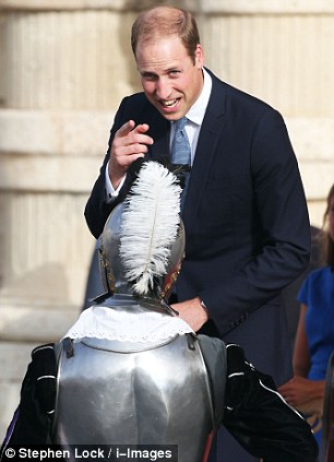 The Duke of Cambridge watches a pageant in St George's Square