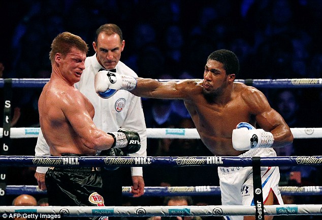 Joshua (right) has not fought since beating Alexander Povetkin at Wembley back in September