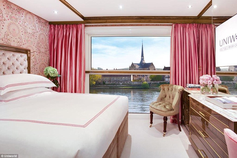 The river cruise ship has lavish decor that includes antiques and artworks from Sotheby’s and Christie’s auction houses